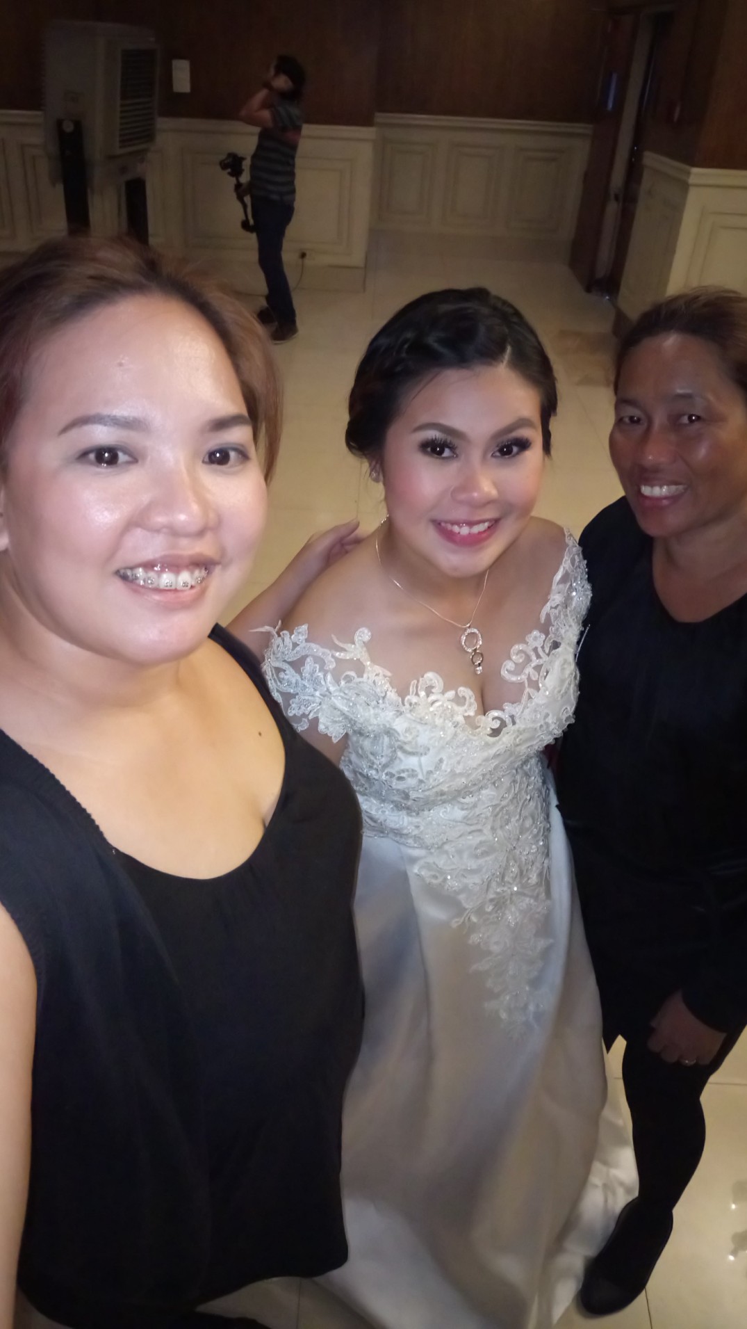 With our Bride taking a quick groupie before the start of reception.